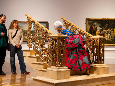 Installation view showing Yinka Shonibare CBE RA, Woman Moving Up, 2023