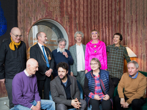 Ten of the twelve committee members for the 2018 Summer Exhibition